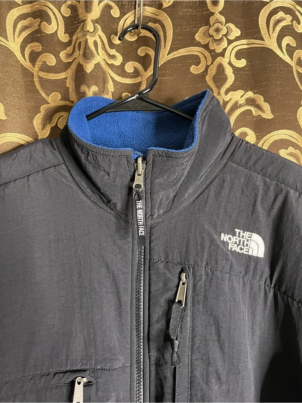 The North Face Men’s Black Denali Jacket with Blue Fleece Lining